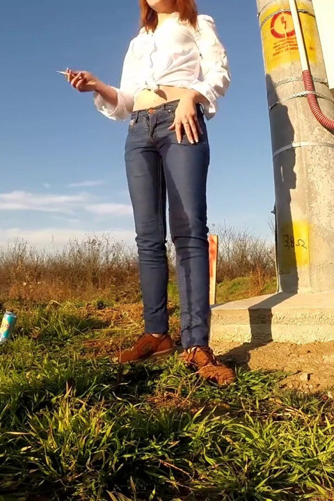 Wetting her jeans really well