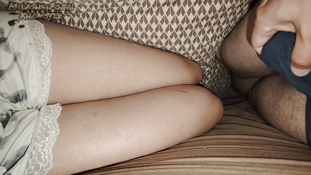 I'm lying next to my stepsister and touching my dick.