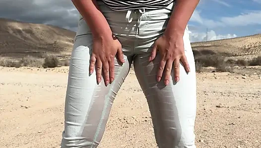Girl can't hold pee and wet her pants on the public road