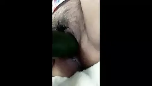 pervert fucks herself with a cucumber and other toys