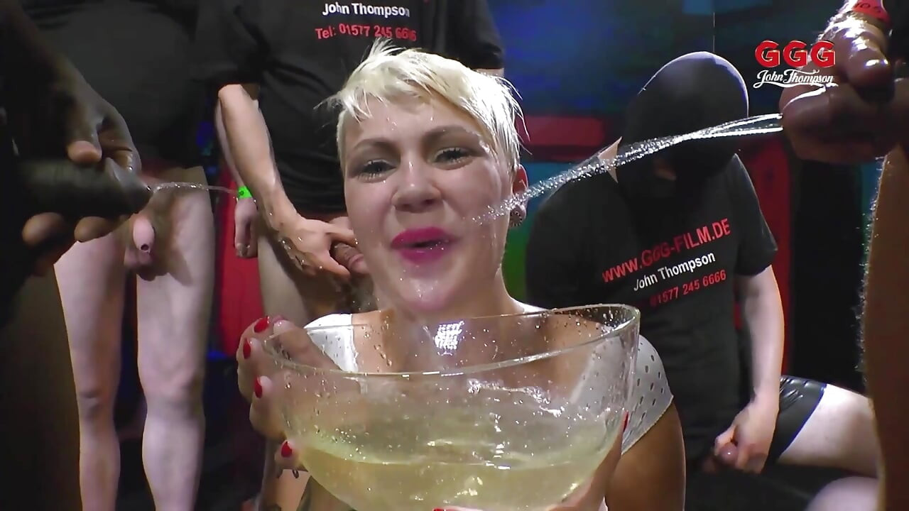 Tattooed Slut Gulps Piss and Cocks in Extreme Ggg Bukkake
