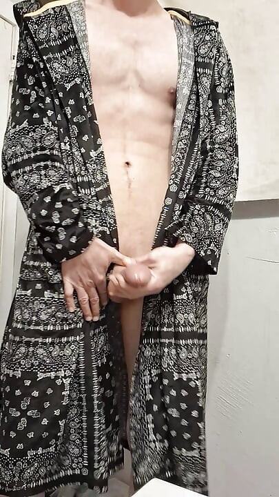 Taking off robe to stroke hard dick