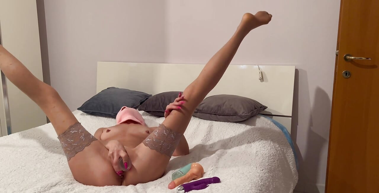 Masturbating with Toys on the Bed