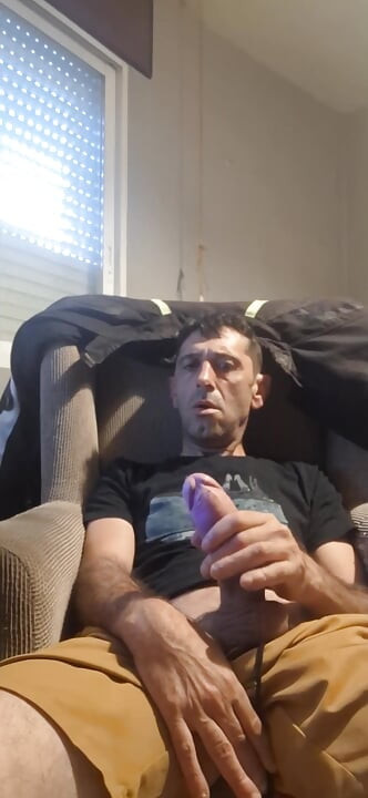 Guy masturbating on the sofa
