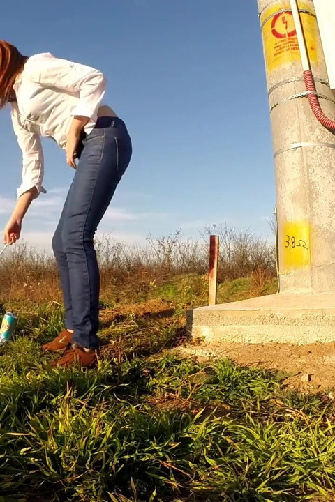 Wetting her jeans really well