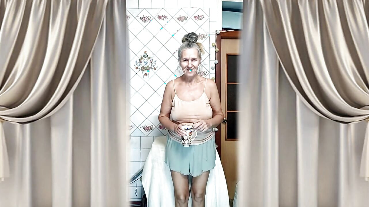 Hot Housewife Lukerya Dances in the Kitchen in the Morning.