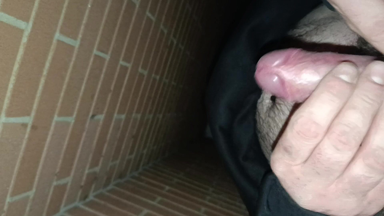 I jerk off and cum outdoors with elastic on my cock