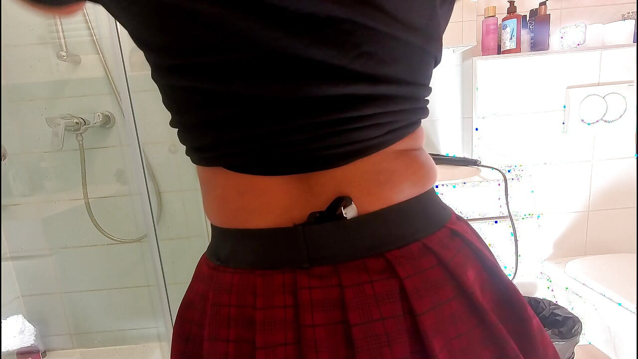 Hottest redhead ever in the bathroom touches herself in a super short college mini skirt