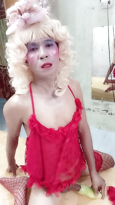 Oanh Le transgender wearing suggestive clothes to play with cans pretending to be too happy