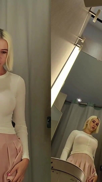 Thrilling moment from "Trying on transparent clothes without panties. Web camera in the fitting room"