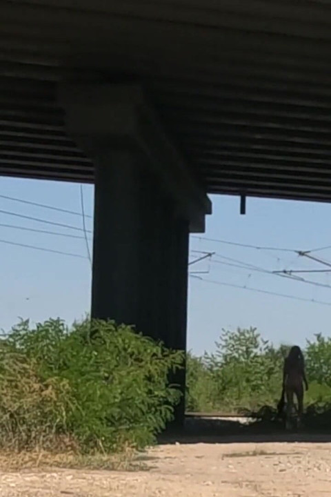 Slave Tih Shows Her Pussy and Tits Under the Bridge