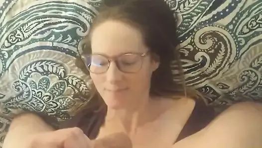 Hottie in Glasses Licks Balls and Gets Cum on Her Face POV