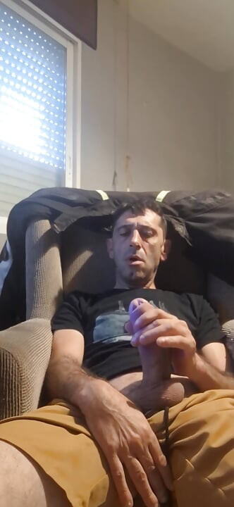 Guy masturbating on the sofa