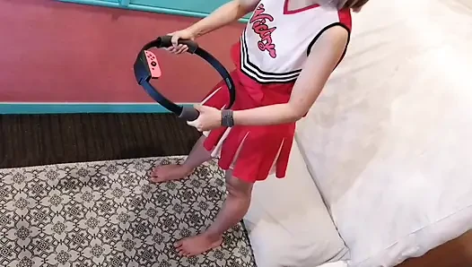 A cute, busty married woman does exercise 3 in a sexy cheerleader costume. Peeking down from above. Home made amateur Private Shoot