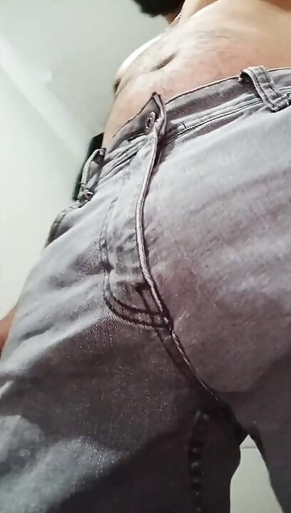 Urinating in Dark Jeans