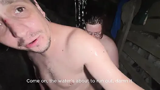 Soapy naked bodies in a rural shower