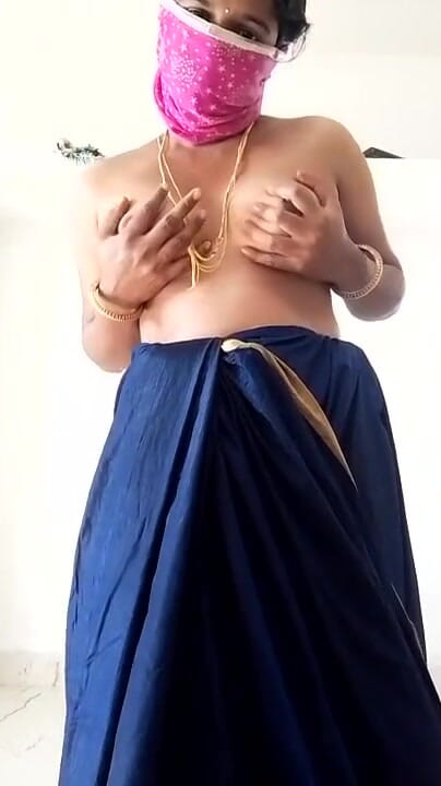 Iconic moment from "Tamil wife Swetha blouse less saree show"