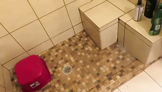 Step mom cleaning bathroom thinks of her step son watching