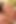 Seksi genç kız tıraşlı amcığını büyük bir dildoyla sikerken eğleniyor