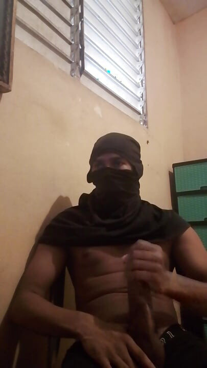 Masked big black cock masturbates