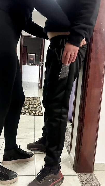 Coworkers hook up and have sex in the company hallway.