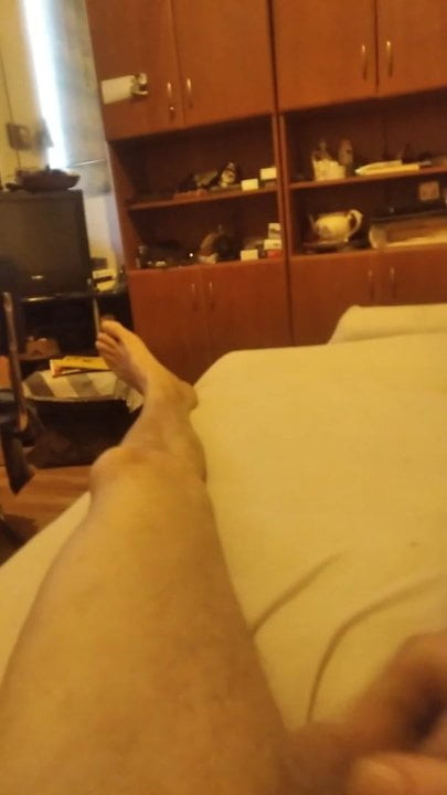 Masturbating