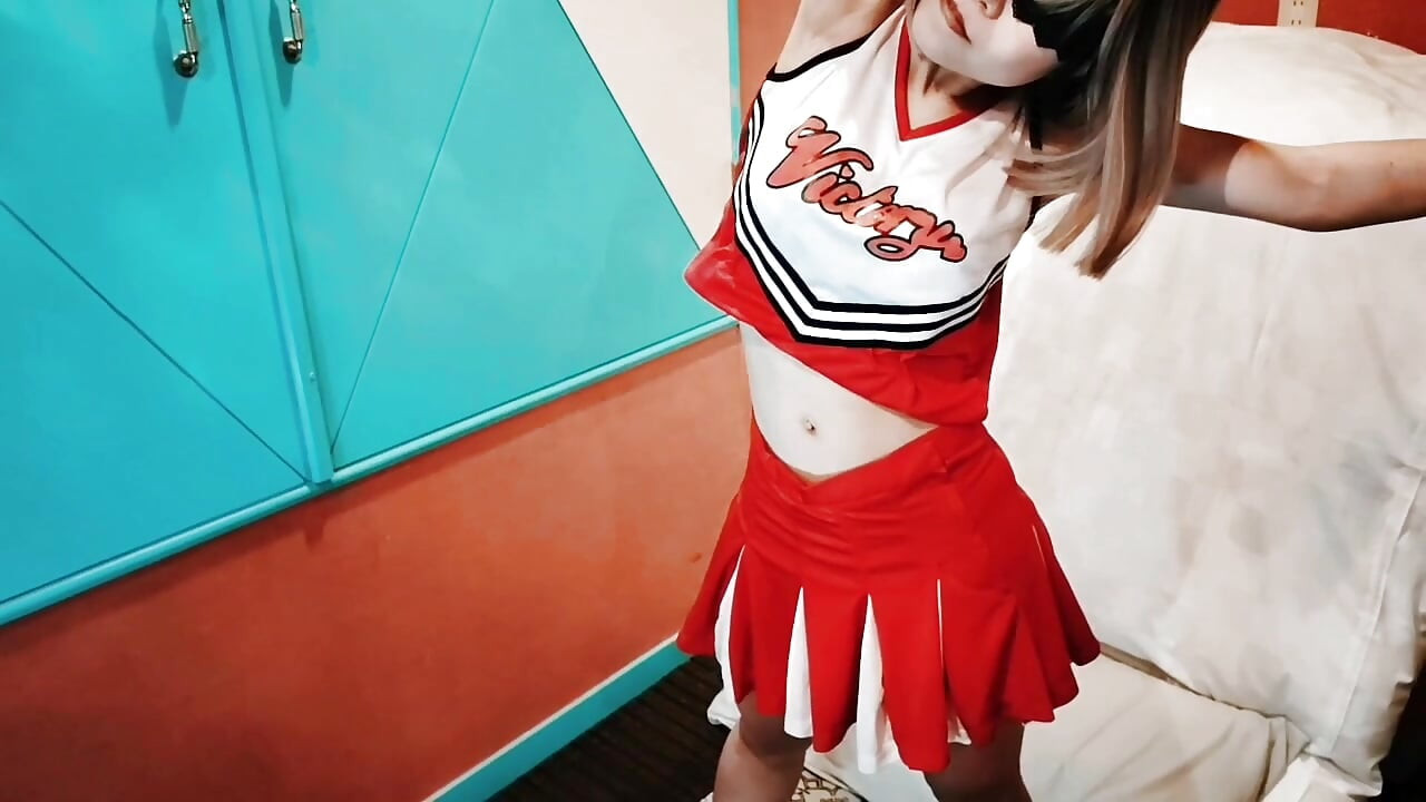 A cute busty married woman exercises 2 in a sexy cheerleader costume. Home made amateur Private Shoot