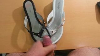 Quick cumshot on my mother's white and black flops sandals