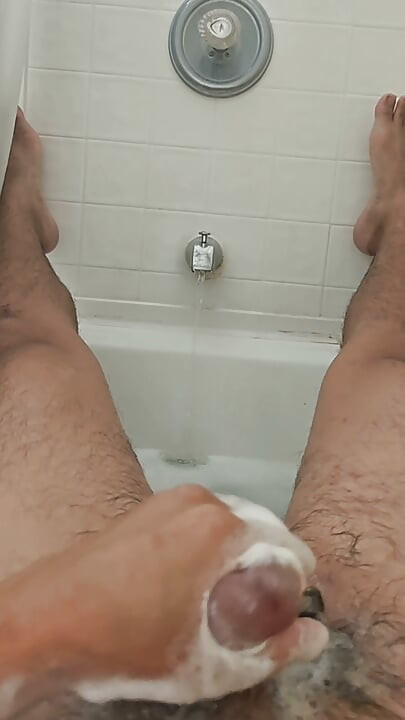 Cleaning Up in the Tub Bathing Solo and Rinsing Off