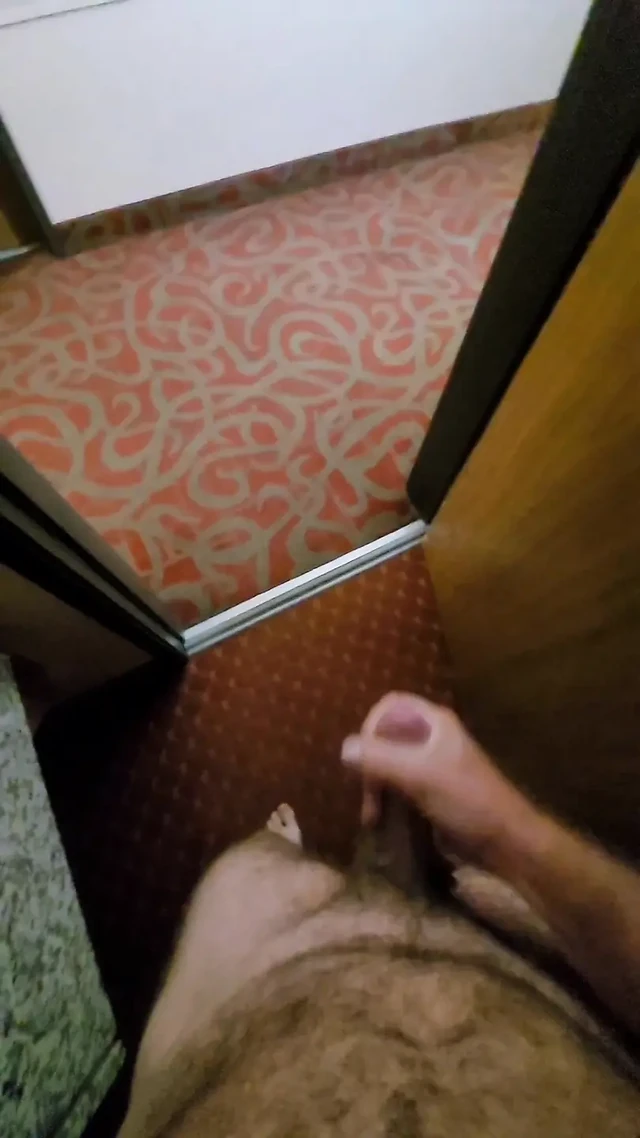 Stroking my cock in cedar rapids hotel with door open in front of camera.