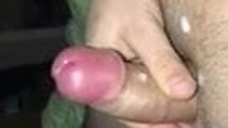Fingering his fat cock
