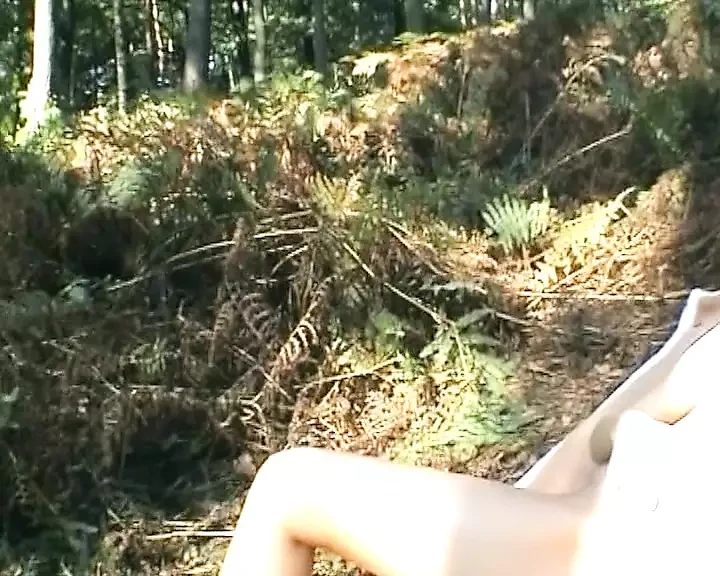 A redhead German woman loves masturbating in the forest