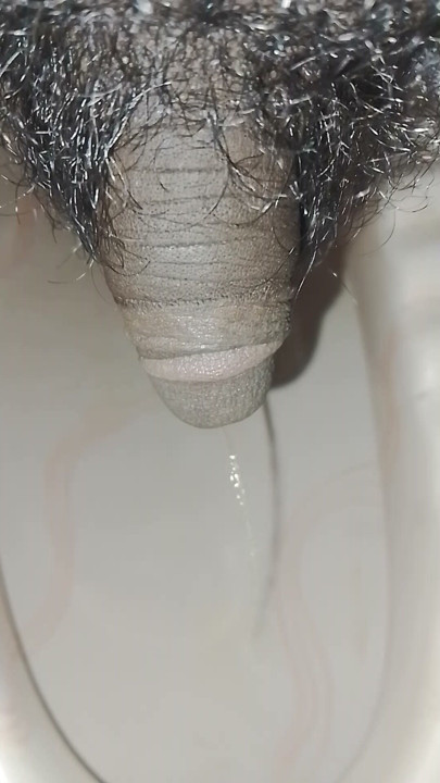 Boy pissing closeup video