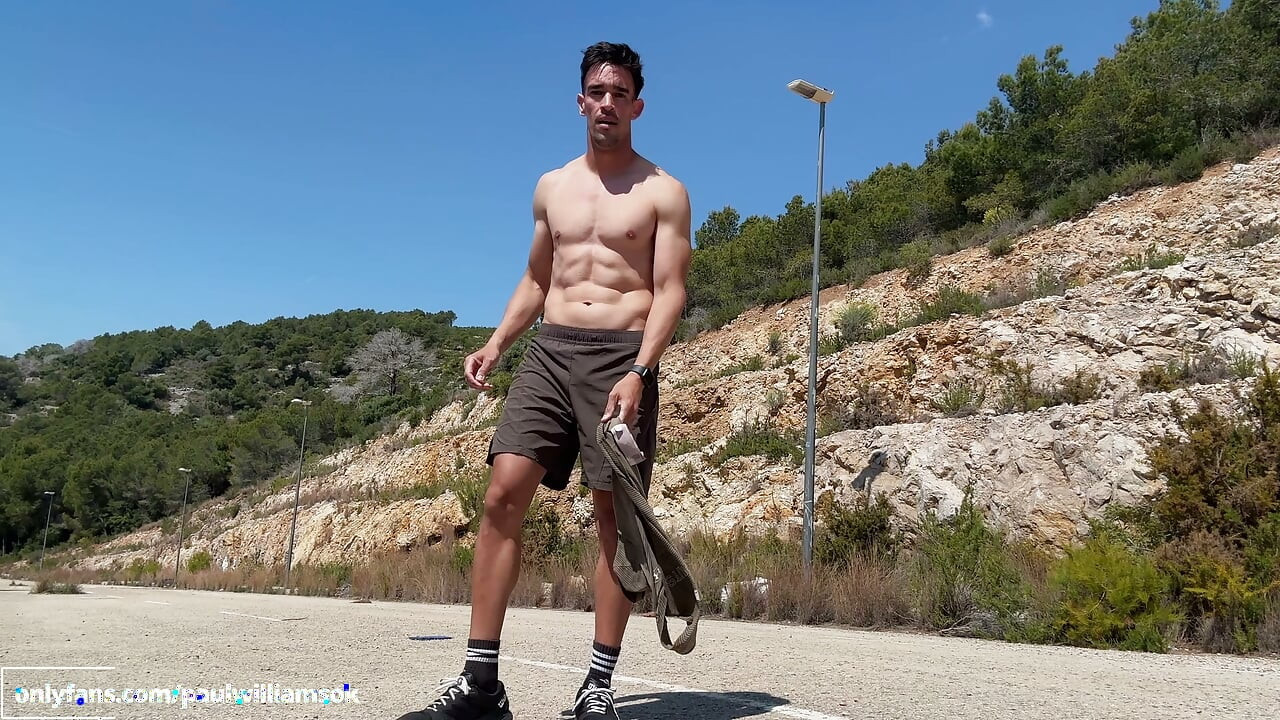 Fitness man training padel naked outdoor