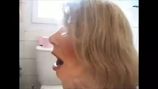 Hot granny is taking bbc cum in mouth then pissing on it