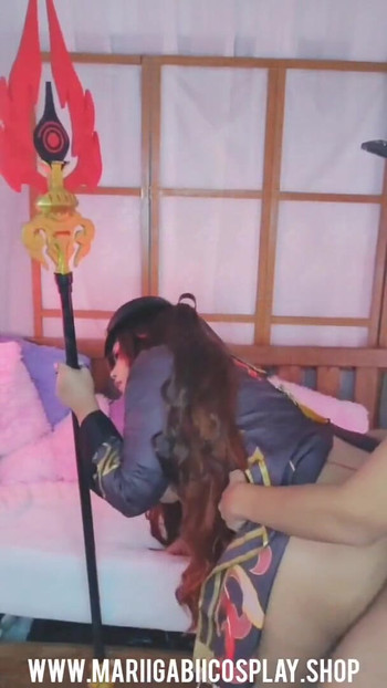 Ključni trenutak iz "Hu tao cosplay genshin impact"