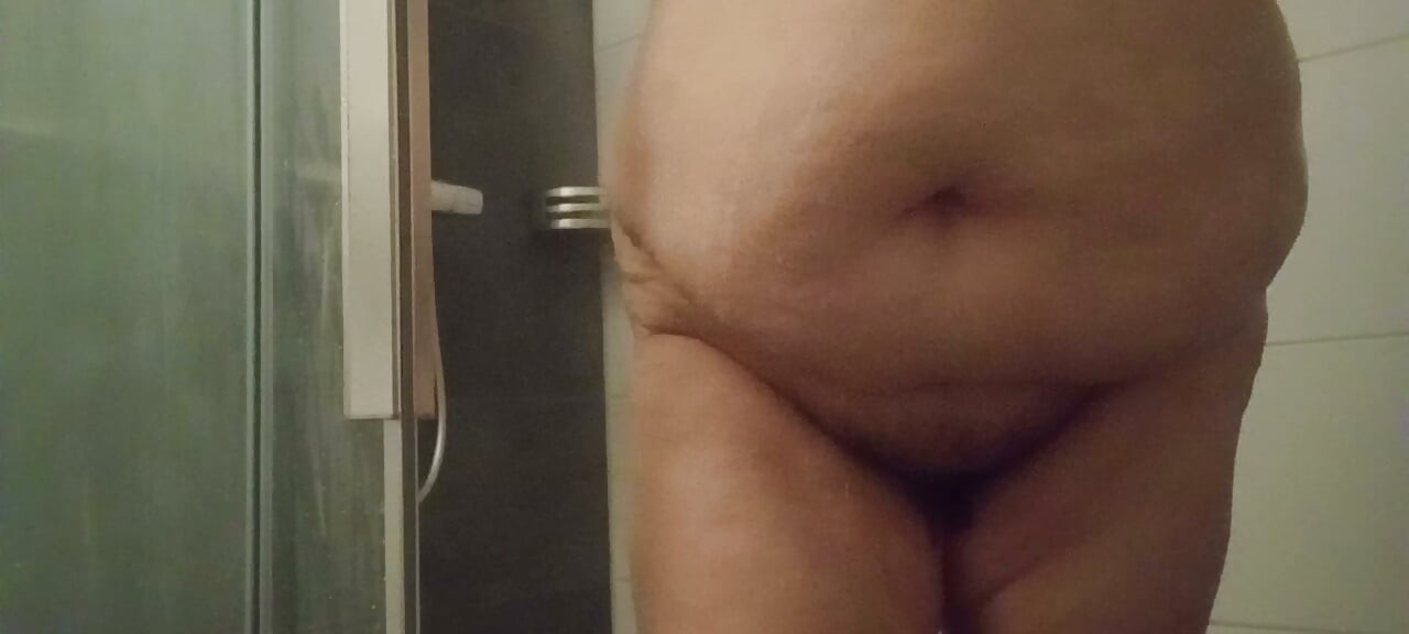 53 year old BBW showers her hairy pussy and big belly