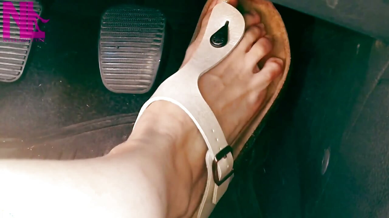 Pedal Pumping in Cream Colored Gizeh Birkenstocks