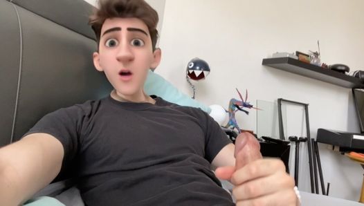 Schattige anime cartoon jongen man trekt zijn pik en komt klaar op zijn gezicht