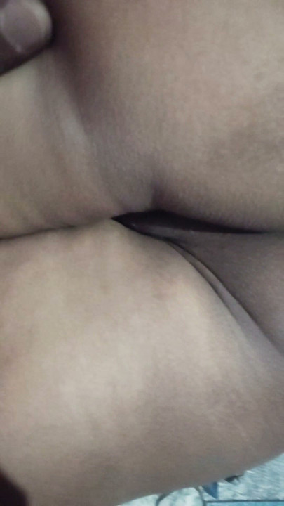 Finger inserted into the hole of the desi sister-in-law's ass.