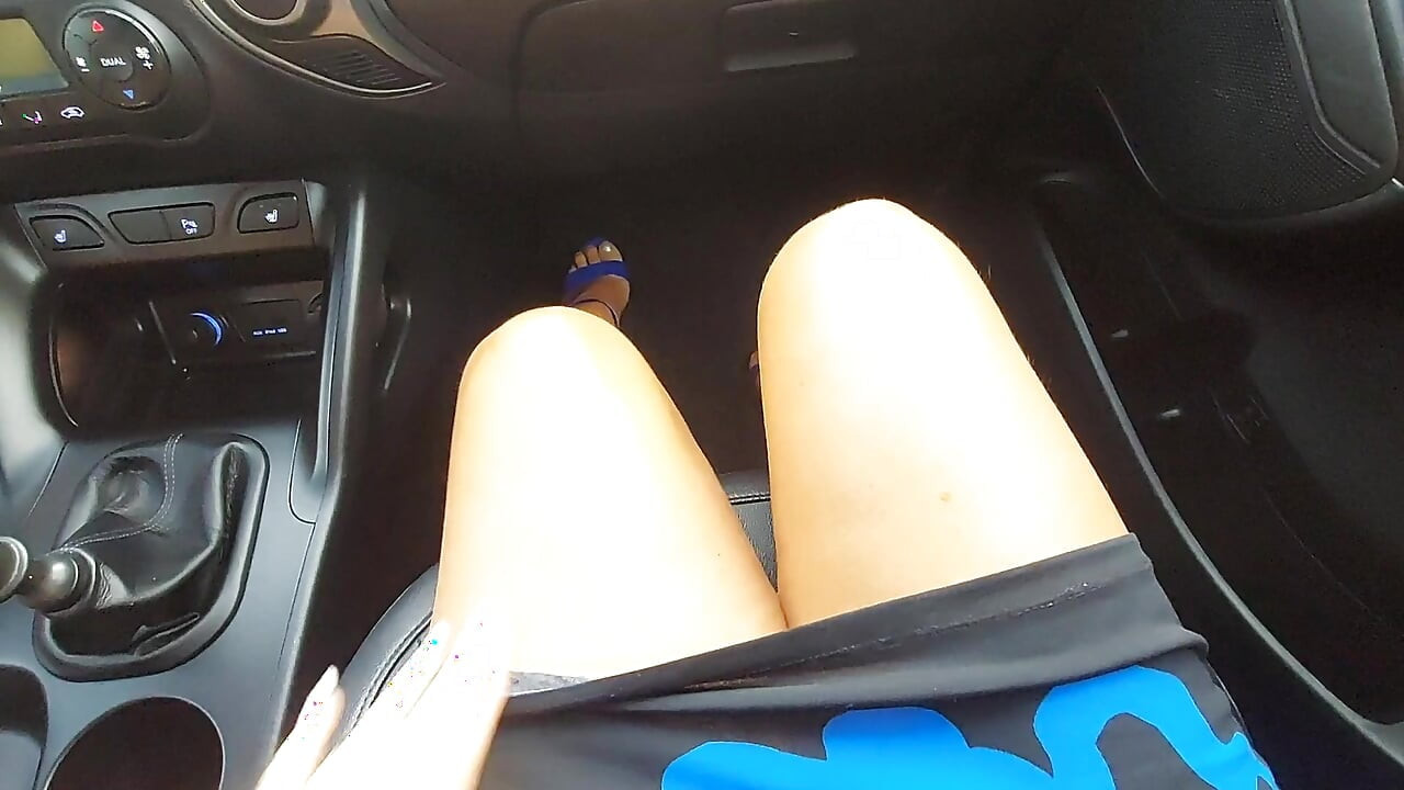 Horny stepmom rubs her pussy in the car in public in front of her stepson
