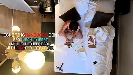 Real college girl in the shortest school uniform skirt plays with a cock by teasing and giving a handjob for her satisfaction