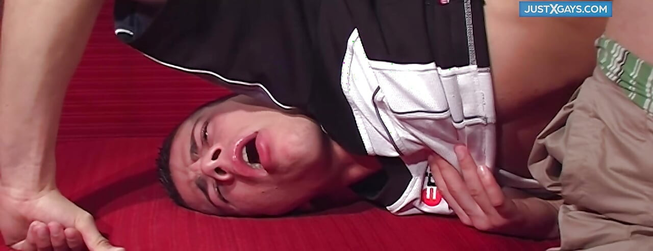 Two gays have fun on the red sofa