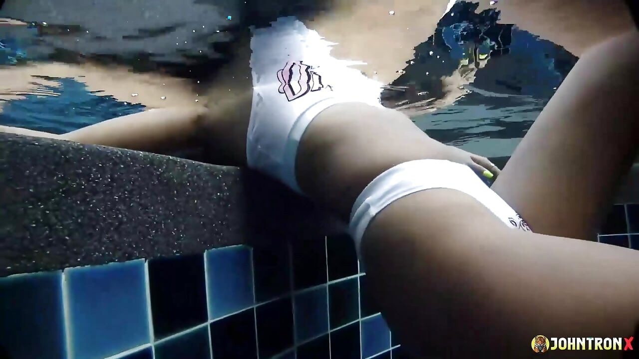 JohnTronX - Gorgeous Thai babe swims in the pool and gets that underwater D