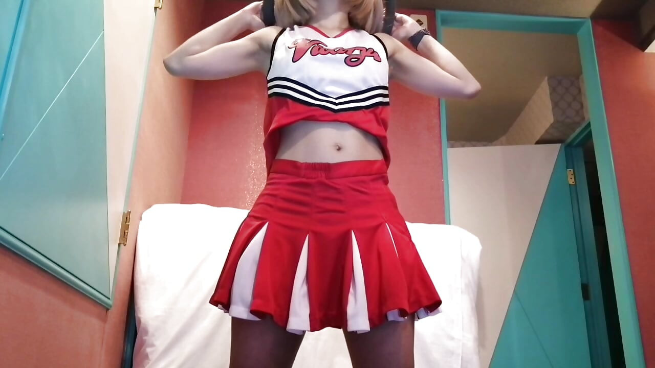 A cute, busty married woman does five exercises in a sexy cheerleader costume. Peeking down from below. Home made amateur Private Shoot