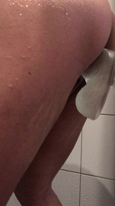 Horny girlfriend takes dildo in shower