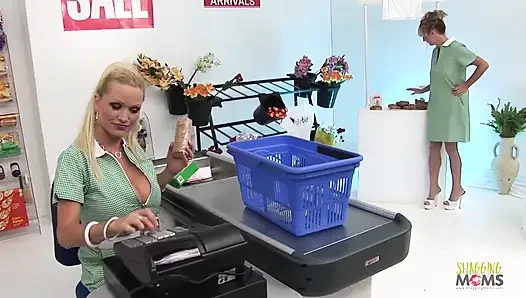 A grocery store foursome begins when the two blonde milfs tease their customer with their big boobs