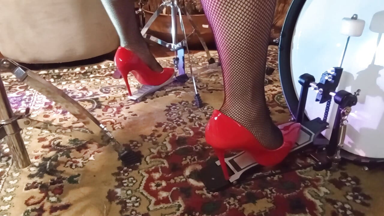 I Play Drums with My New Red Stilleto