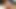 2022-04-27 Tiny Tomoka sex doll, front view fumbling on desk chair.