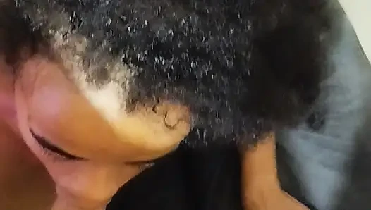 Shy young girl sucking hot